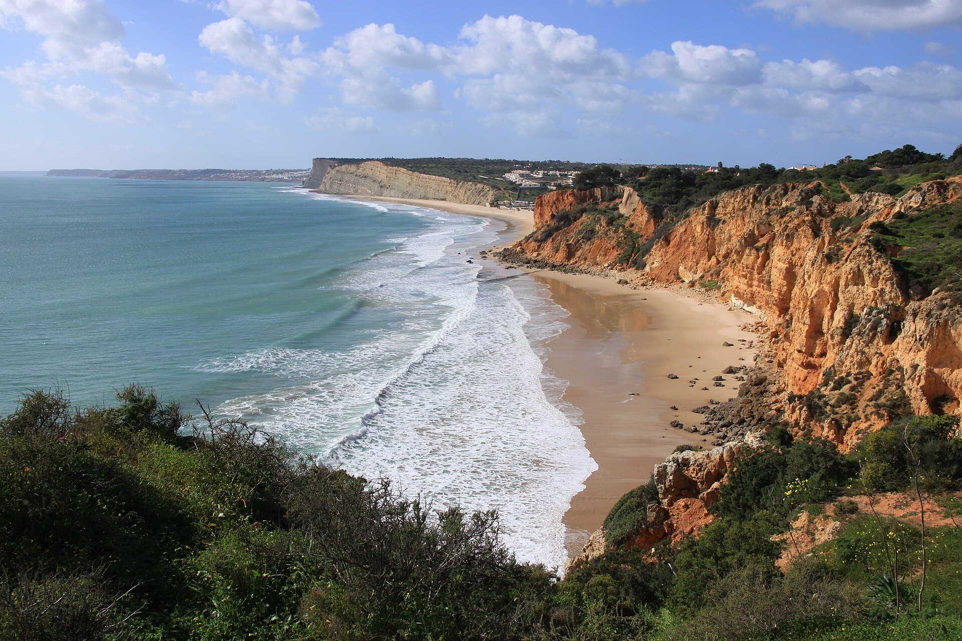 Algarve Portugal cliffs and turquoise cove coastline near Lagos