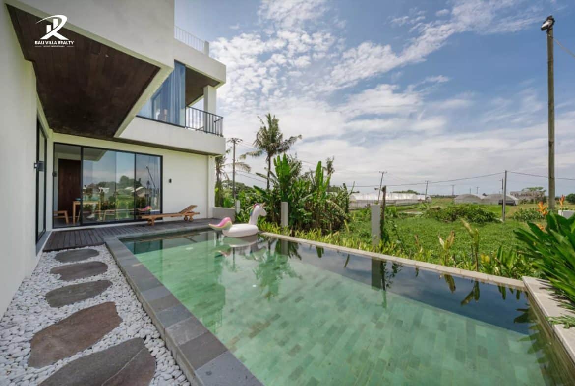 FREEHOLD INVESTMENT: 3-BR Rice Field Sky Villa with Rooftop Deck in Prime Kedungu